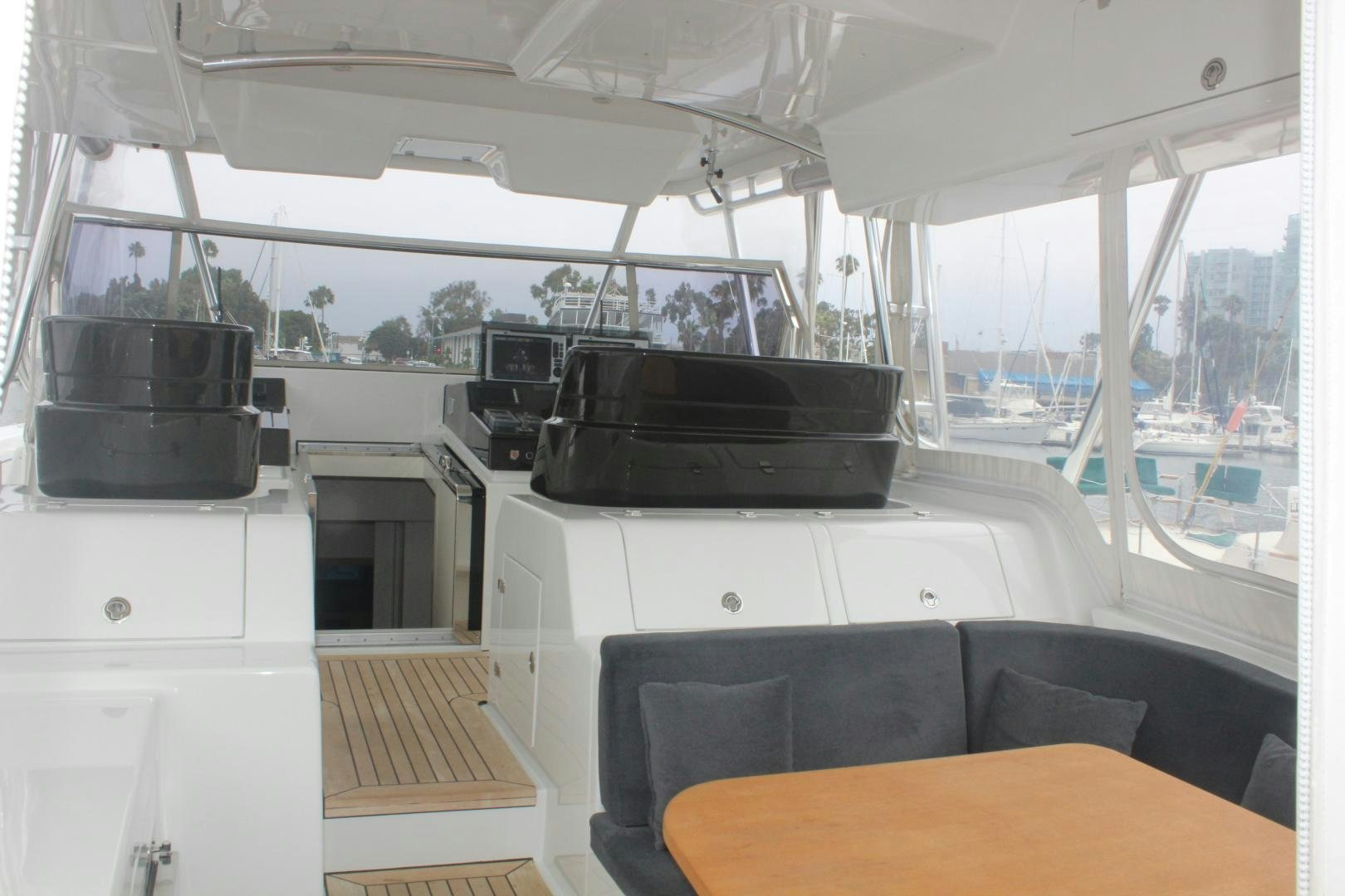 a black coffee maker on a white table in a boat aboard FELINA Yacht for Sale