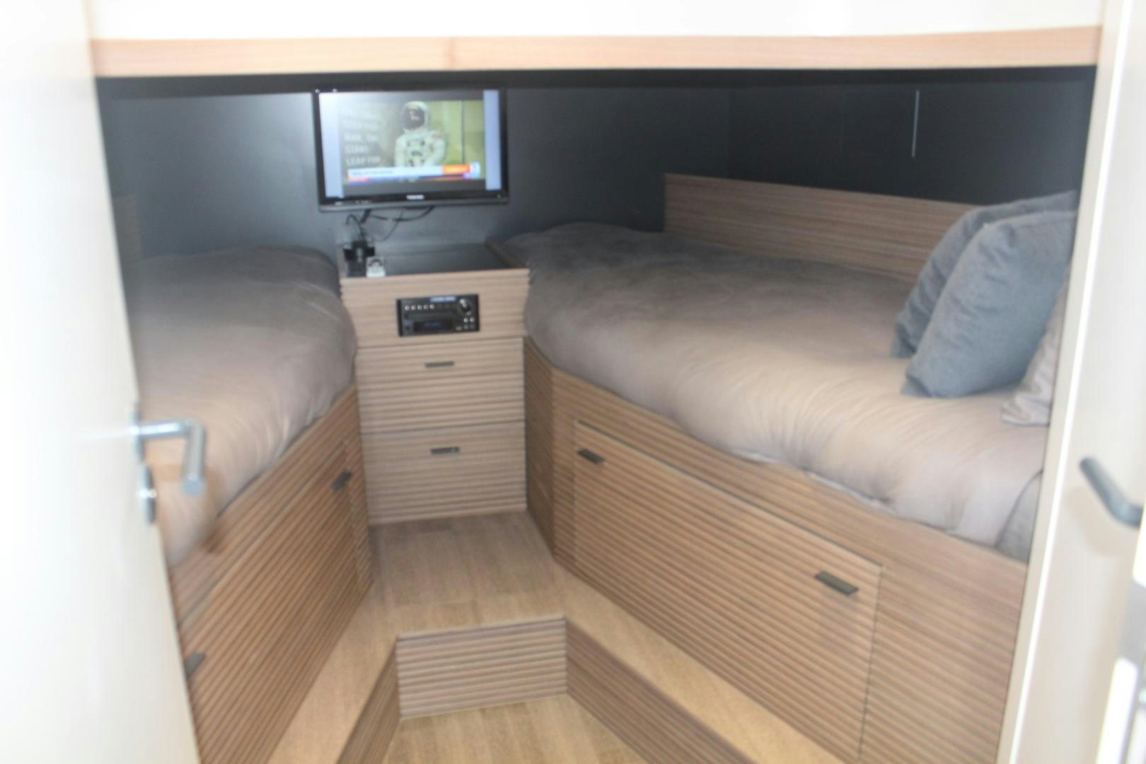 a couch in a room aboard FELINA Yacht for Sale