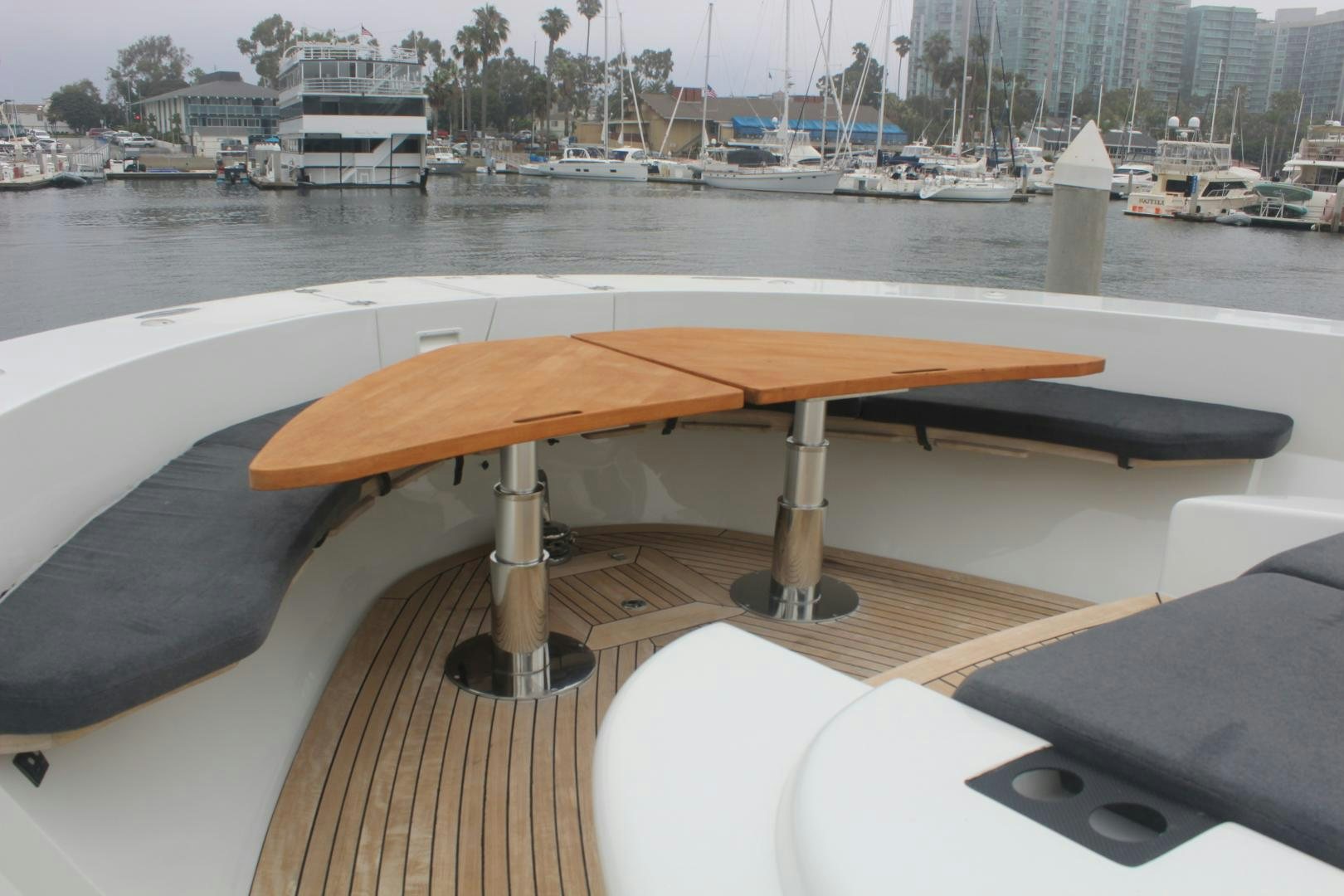 a wooden table on a boat aboard FELINA Yacht for Sale