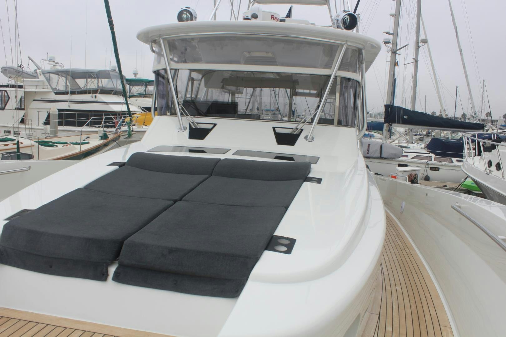 a boat parked in a harbor aboard FELINA Yacht for Sale