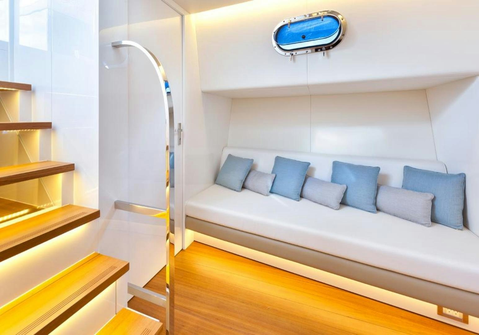 a room with a bed and a desk aboard LANGARA Yacht for Sale