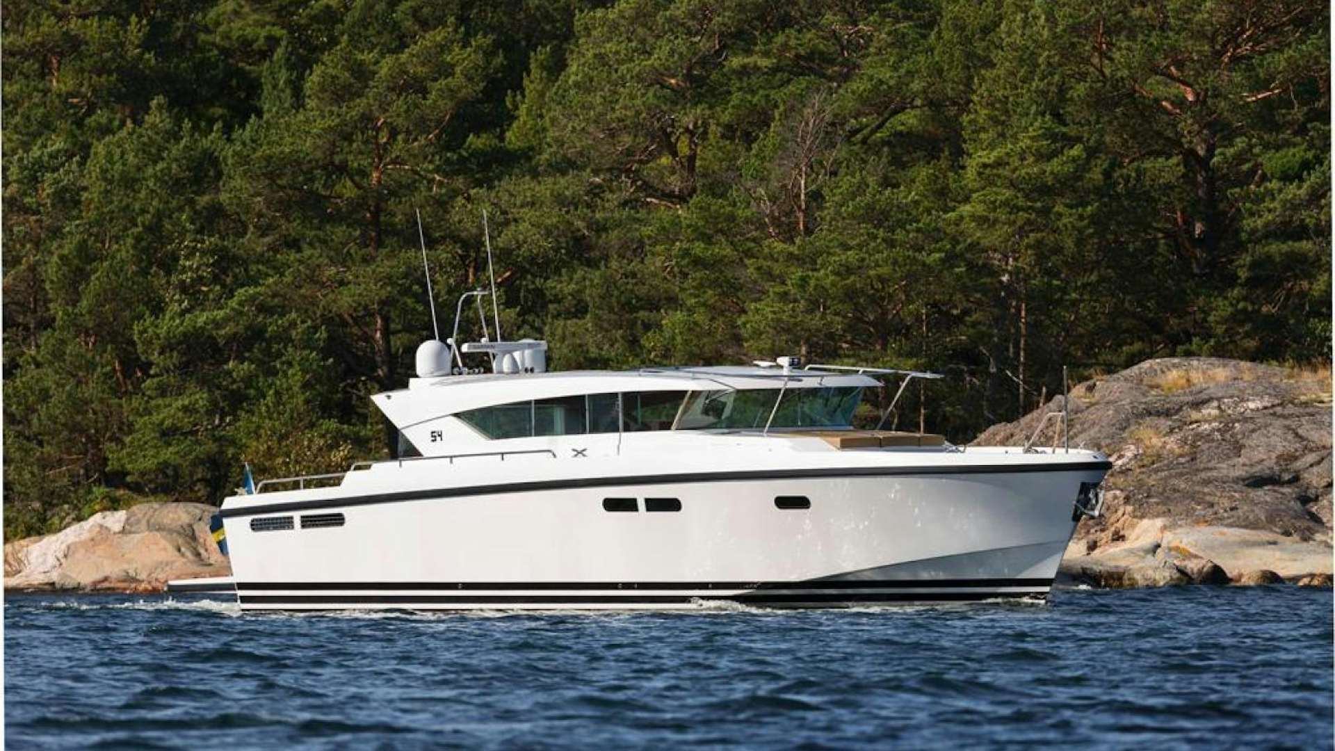 a boat on the water aboard DELTA CARBON 54 Yacht for Sale