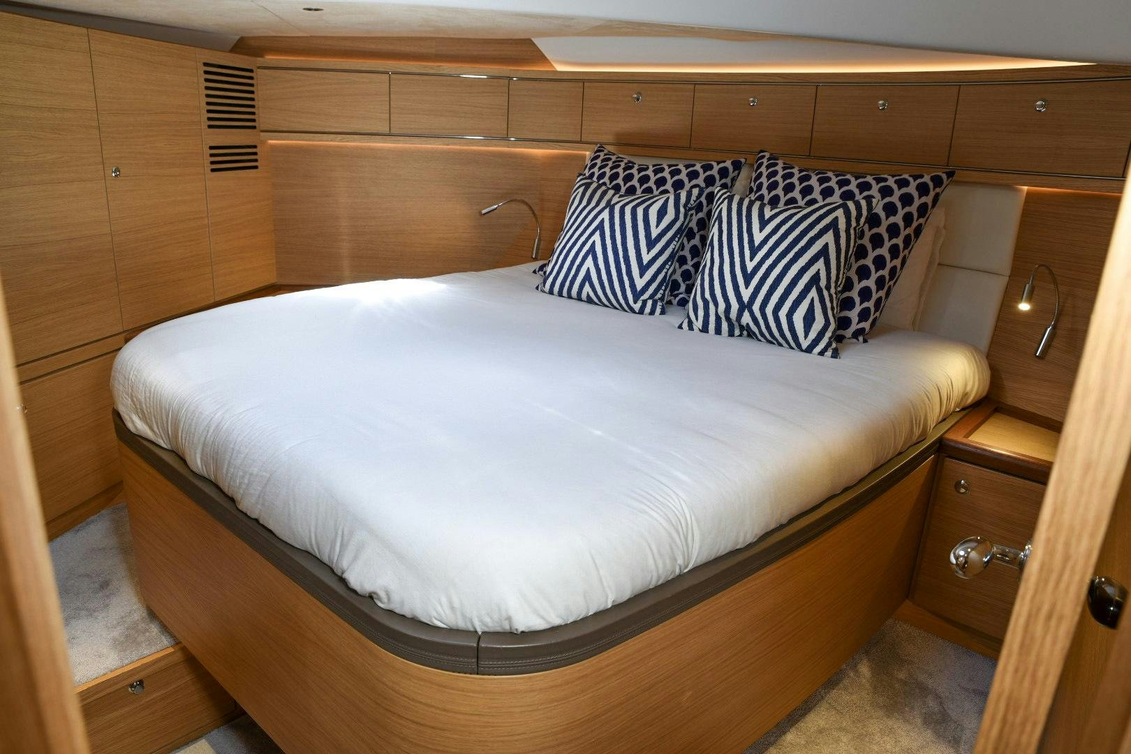 a bed in a room aboard ALMOST HEAVEN Yacht for Sale