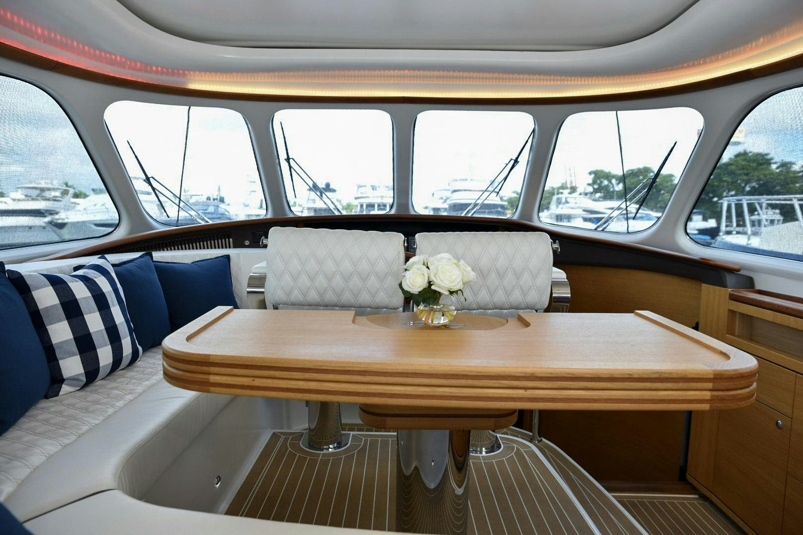 a car with a flower on the side aboard ALMOST HEAVEN Yacht for Sale