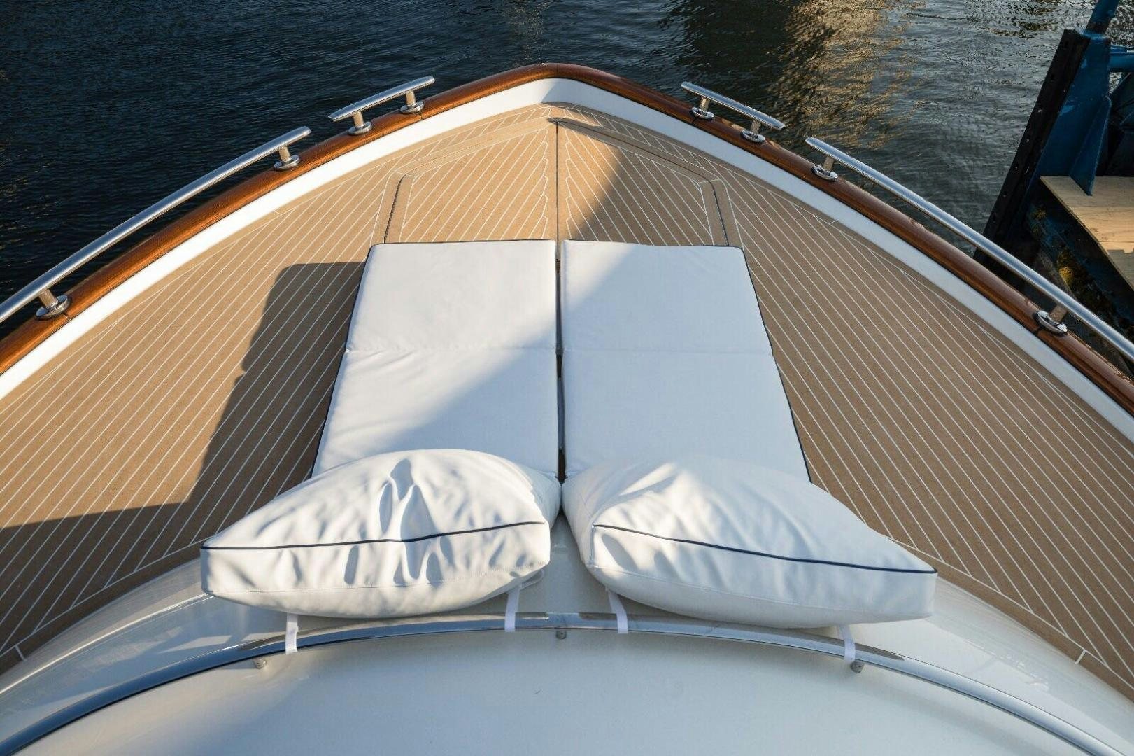 a boat with a couple of umbrellas on it aboard ALMOST HEAVEN Yacht for Sale