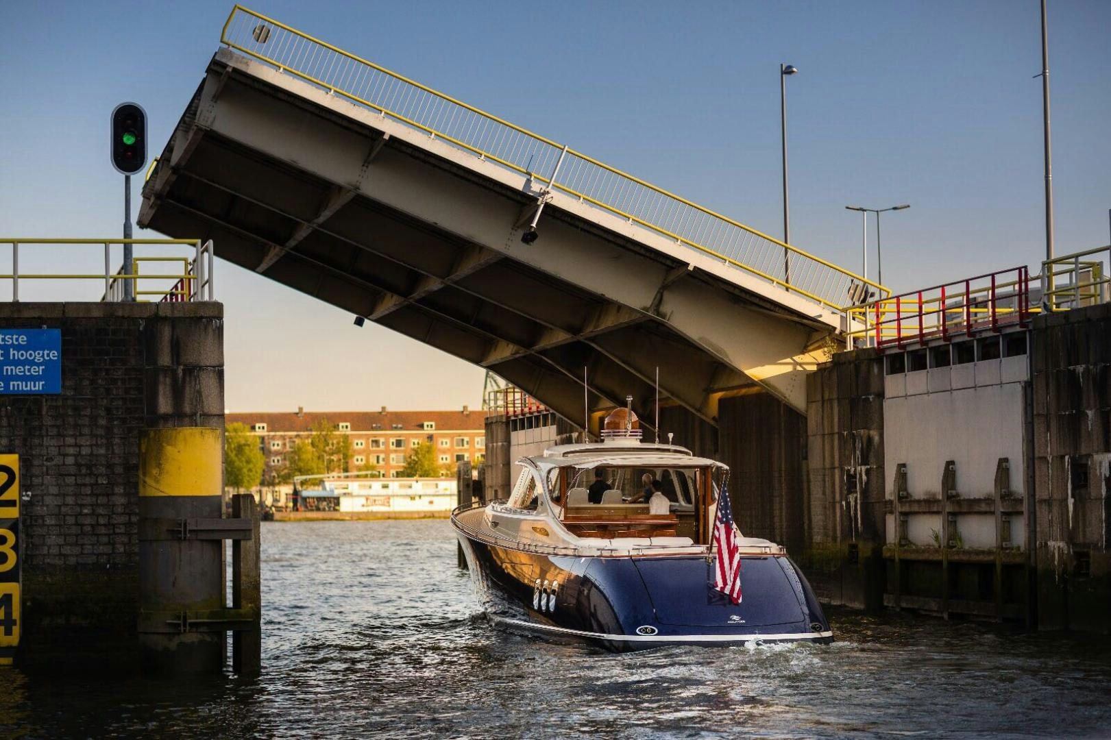 a boat under a bridge aboard ALMOST HEAVEN Yacht for Sale