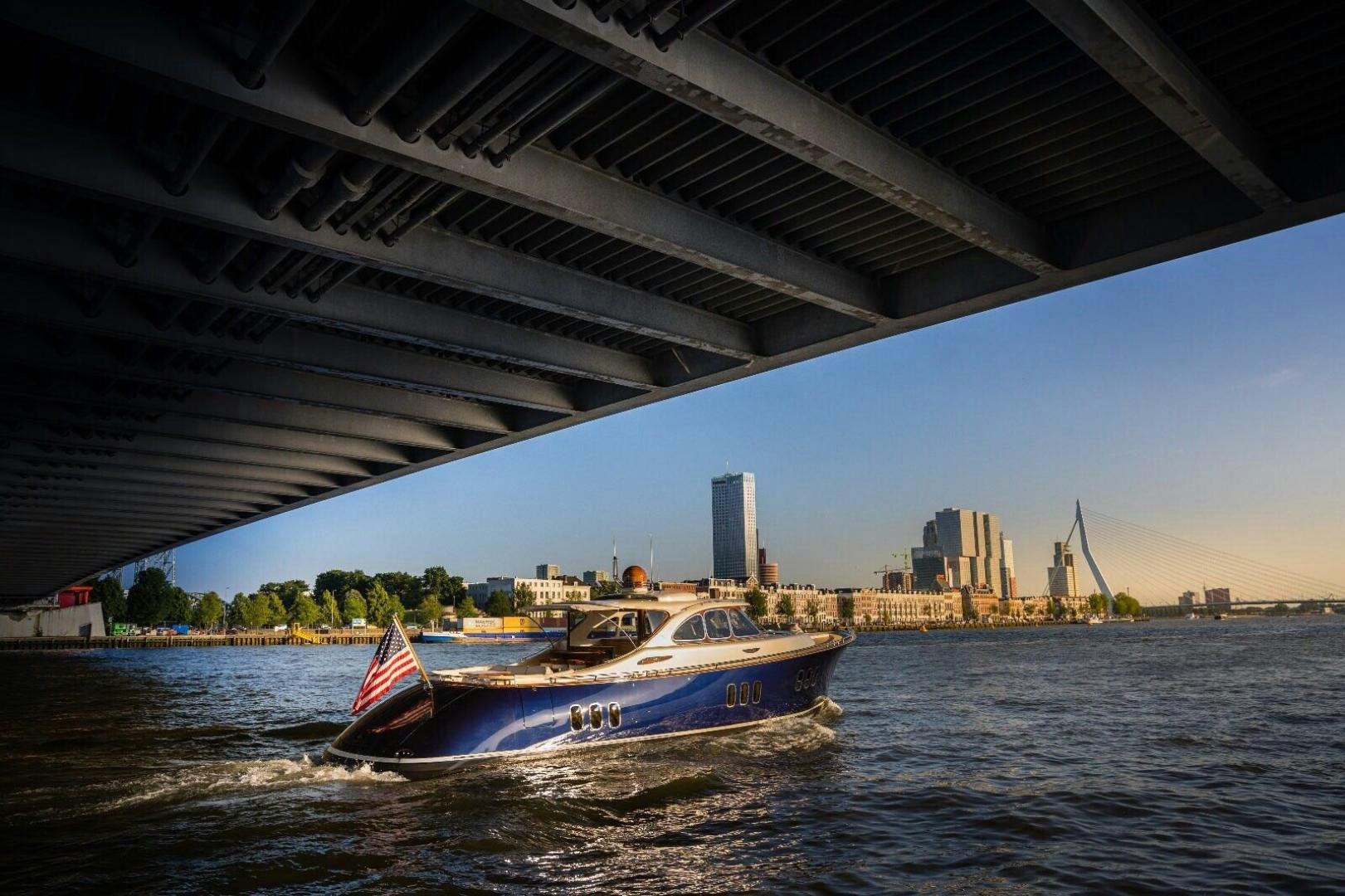 a boat under a bridge aboard ALMOST HEAVEN Yacht for Sale