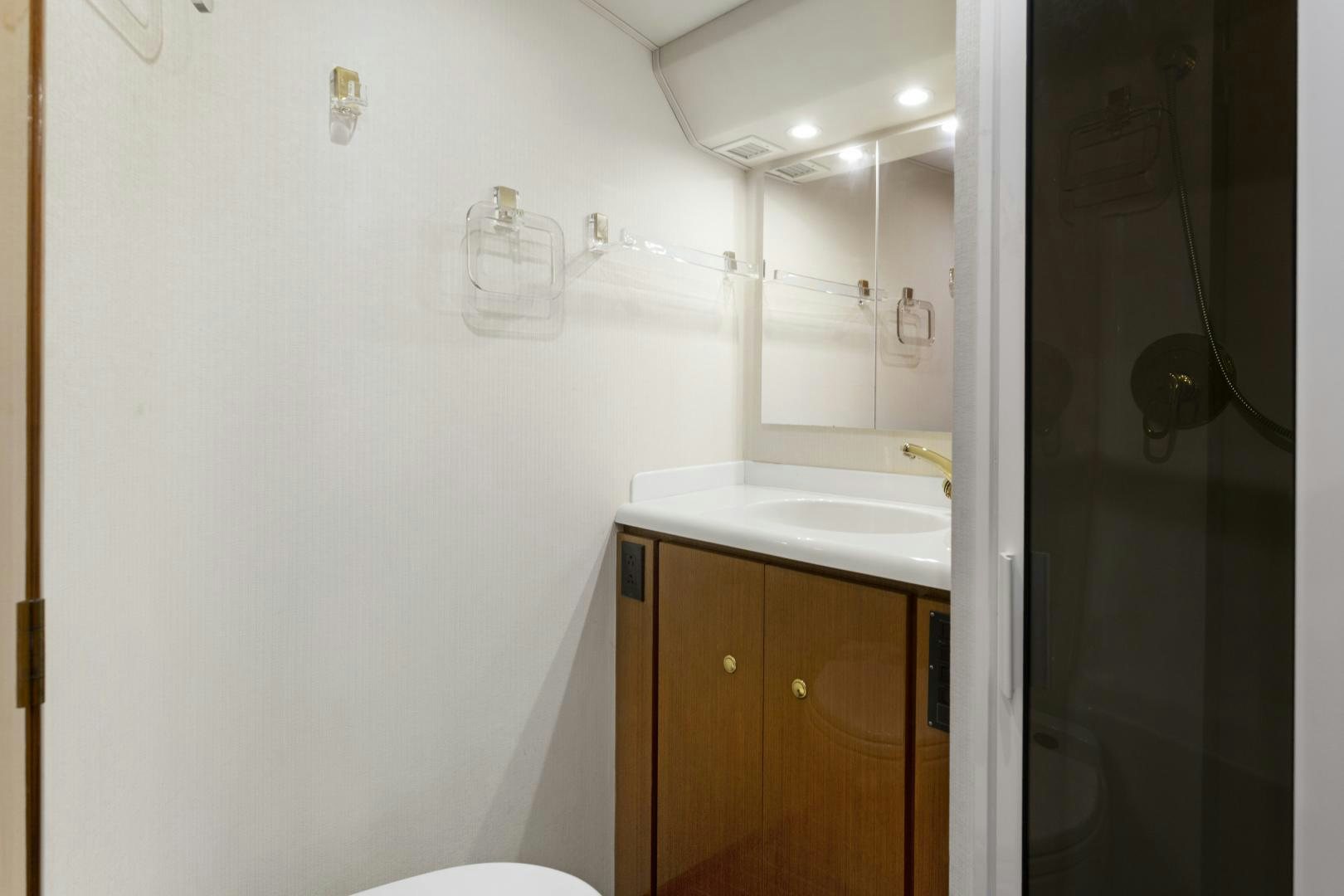 a bathroom with a shower and sink aboard ROCKETSHIP Yacht for Sale