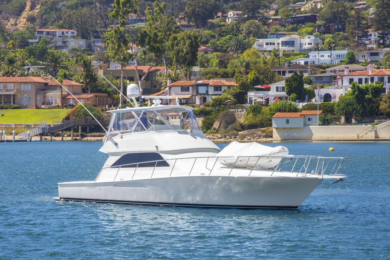 a white boat in the water aboard ROCKETSHIP Yacht for Sale