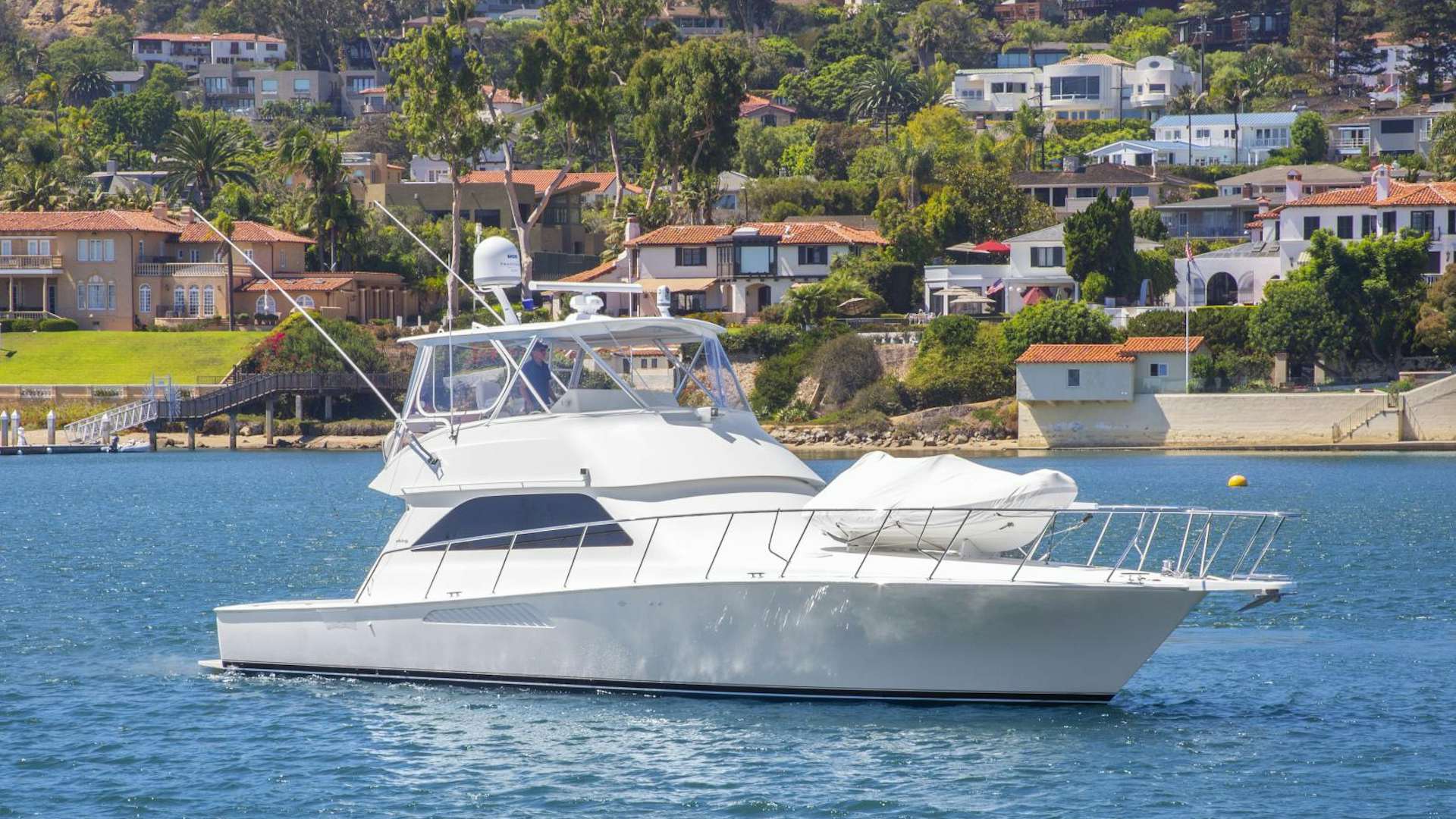 a white boat in the water aboard ROCKETSHIP Yacht for Sale