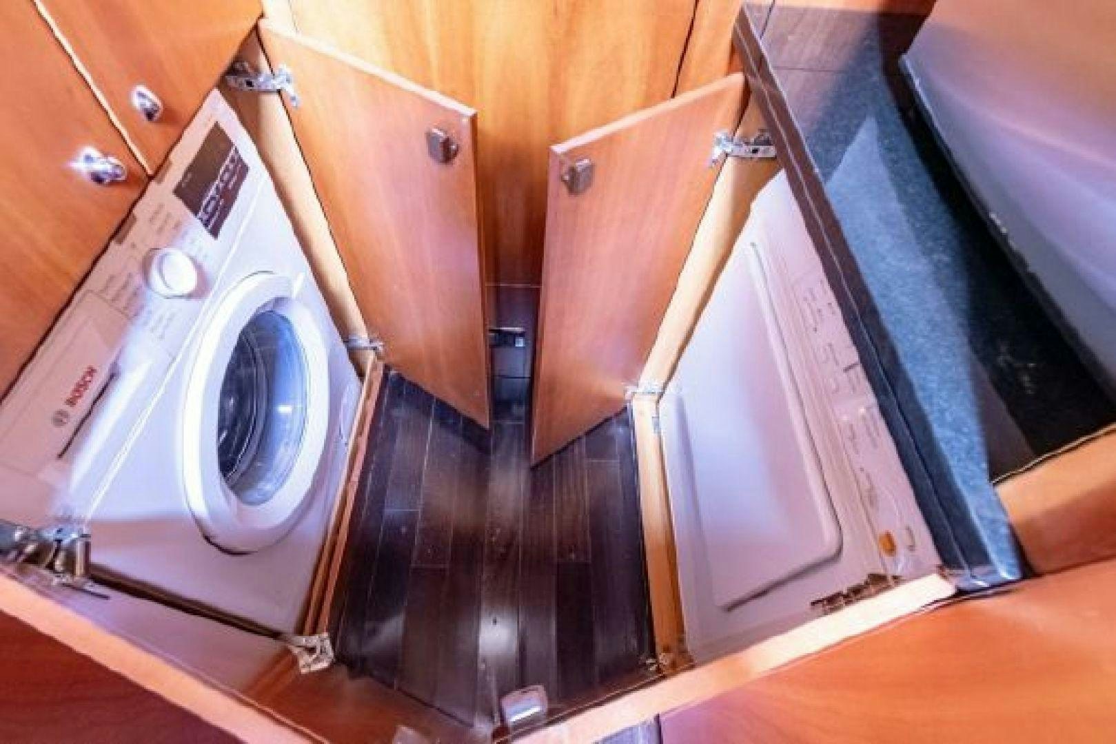 a white washing machine aboard SOLE MIO Yacht for Sale