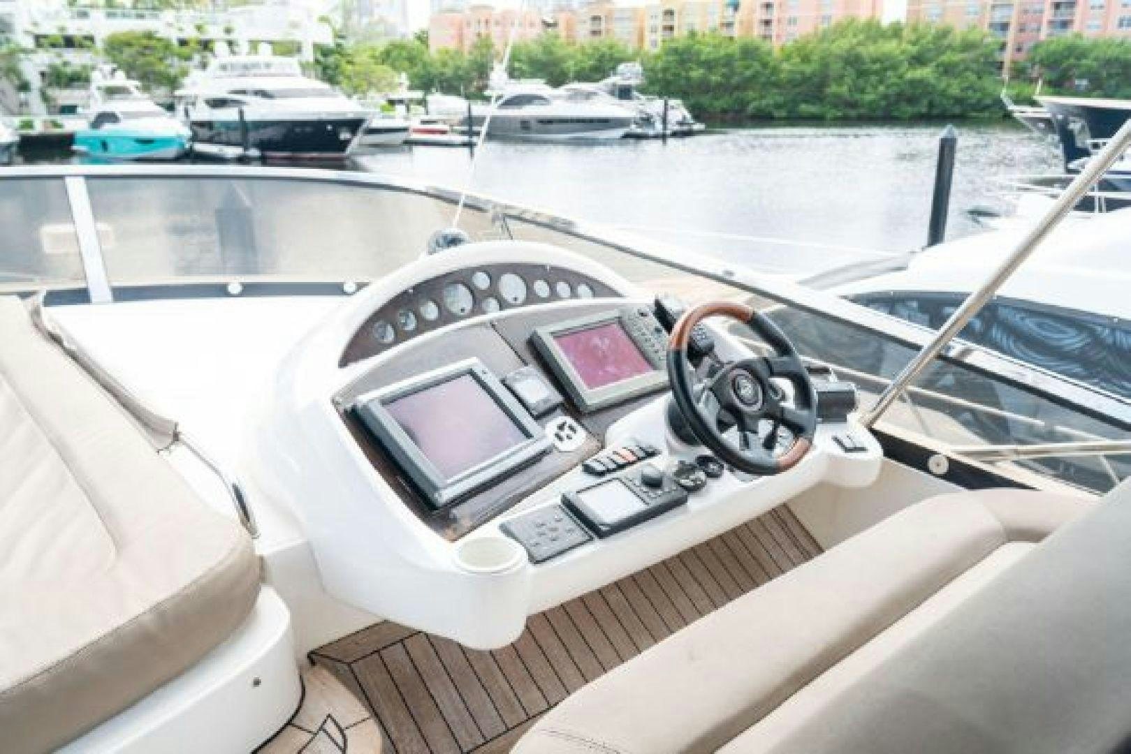 a steering wheel on a boat aboard SOLE MIO Yacht for Sale