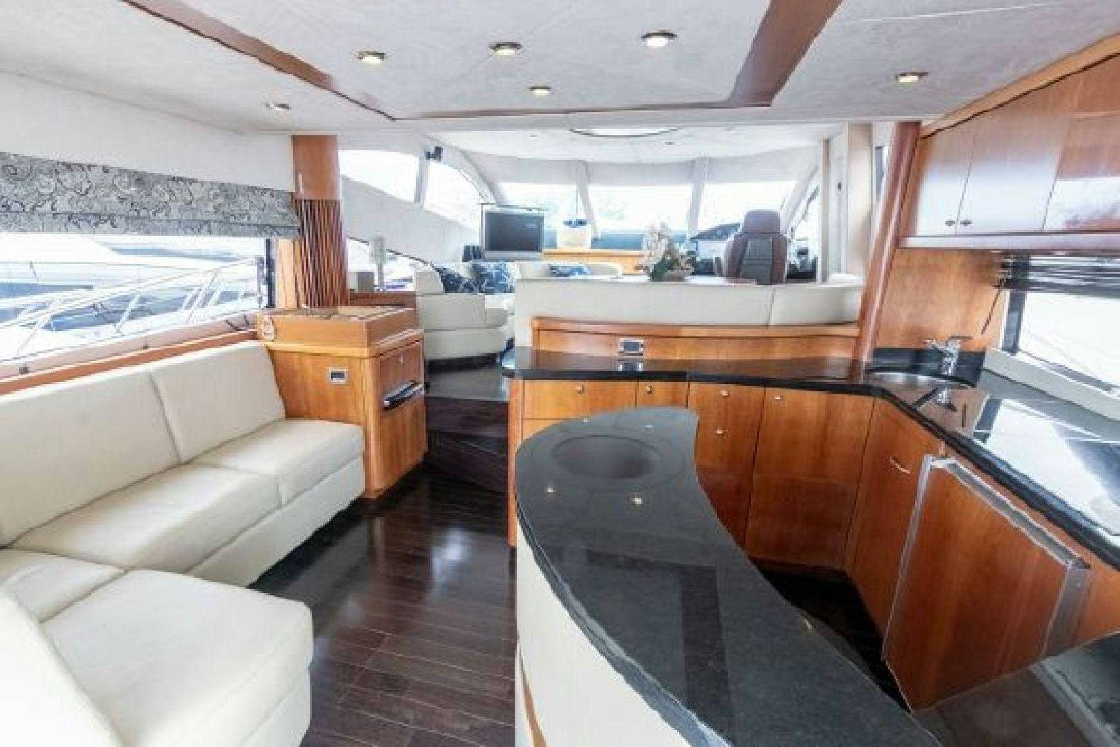 a large kitchen with a large island aboard SOLE MIO Yacht for Sale