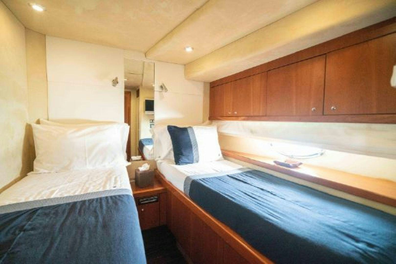 a room with two beds aboard SOLE MIO Yacht for Sale