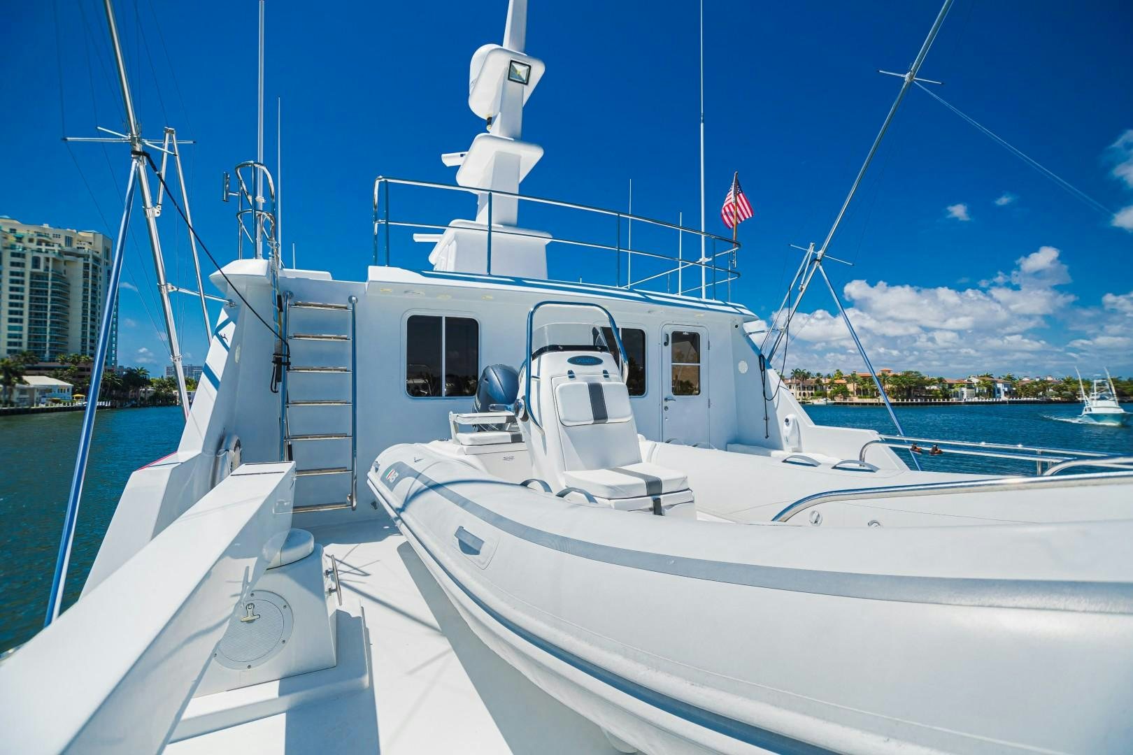 a boat with a staircase attached aboard NO BOUNDARIES Yacht for Sale