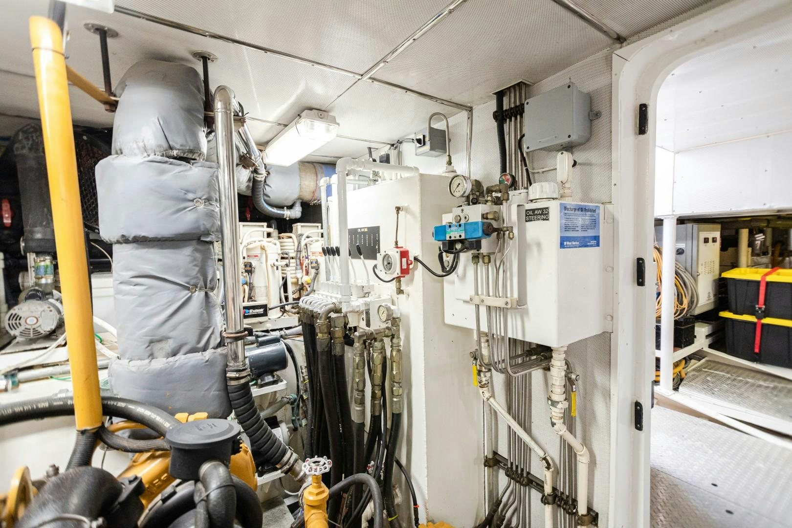 a room with machinery aboard NO BOUNDARIES Yacht for Sale