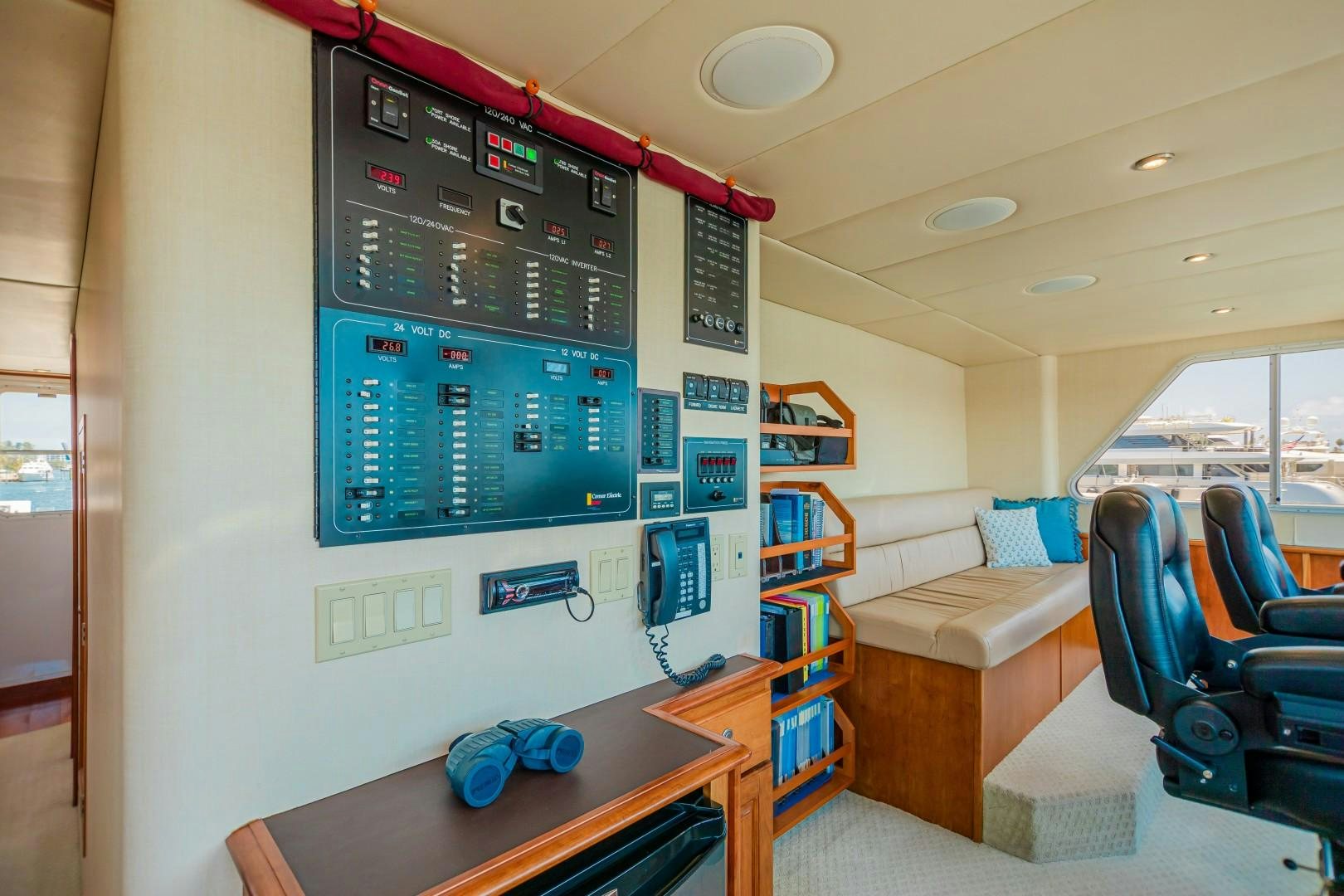 a room with a table and chairs aboard NO BOUNDARIES Yacht for Sale