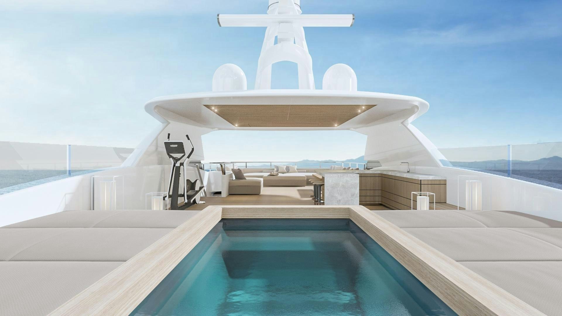 a large white building with a large white plane flying over it aboard EXTRA TIME Yacht for Sale