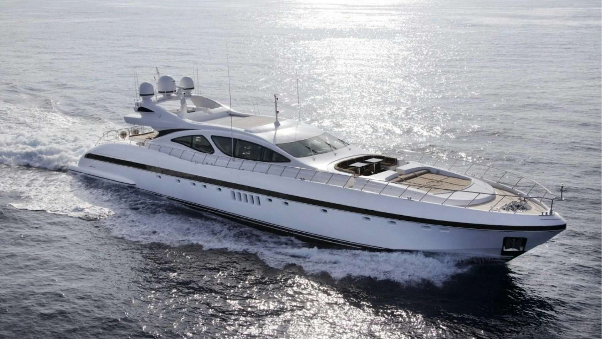a white yacht in the water aboard PLAN A Yacht for Sale