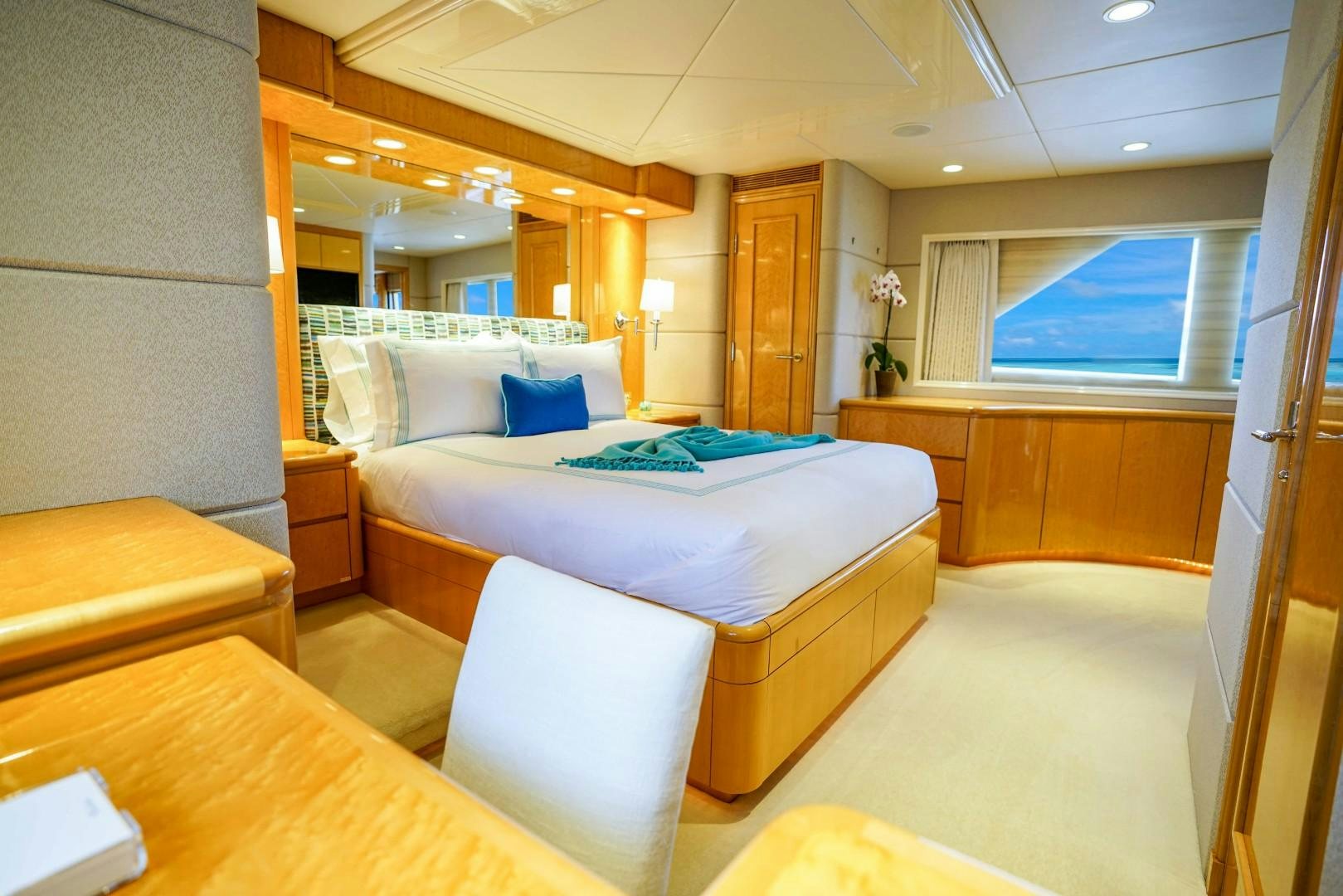 a room with a bed and a desk aboard PROBABILTY Yacht for Sale