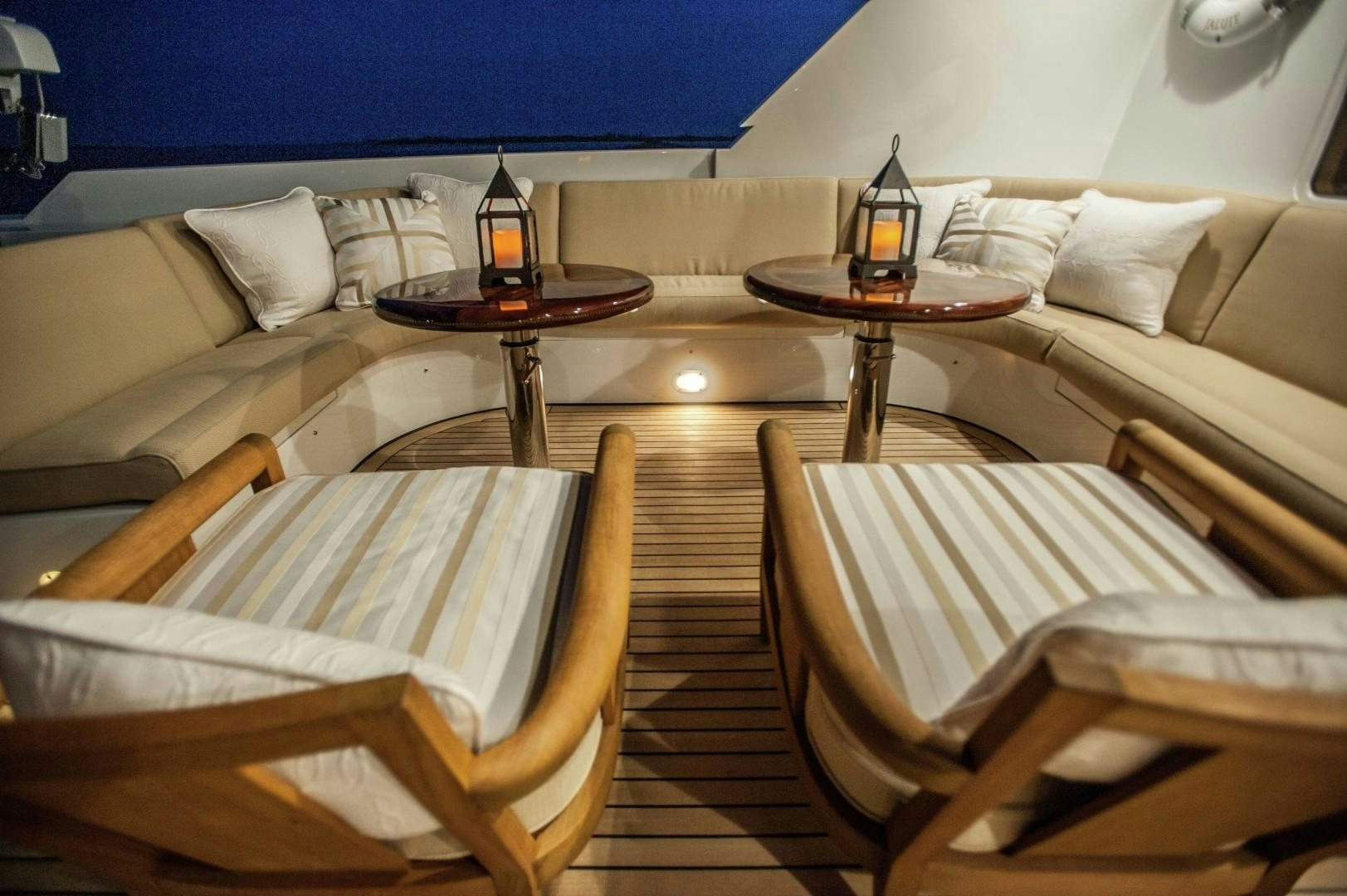 a room with a table and chairs aboard PROBABILTY Yacht for Sale