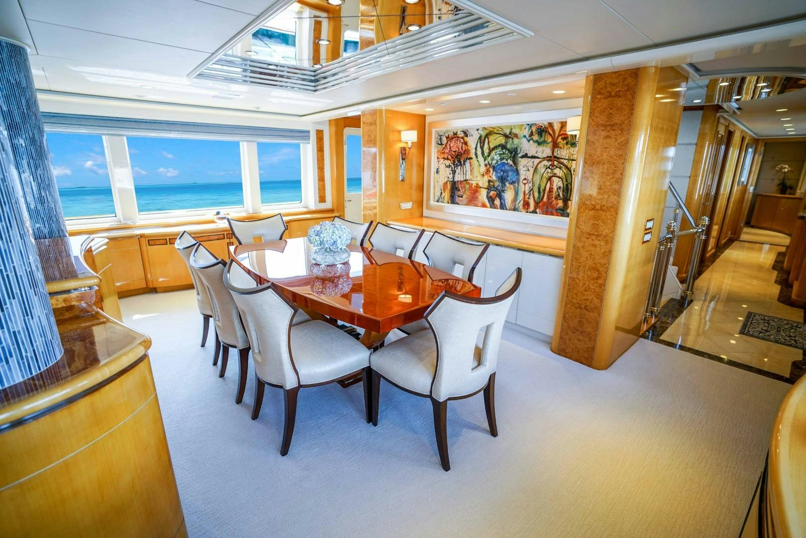 a dining room with a table aboard PROBABILTY Yacht for Sale