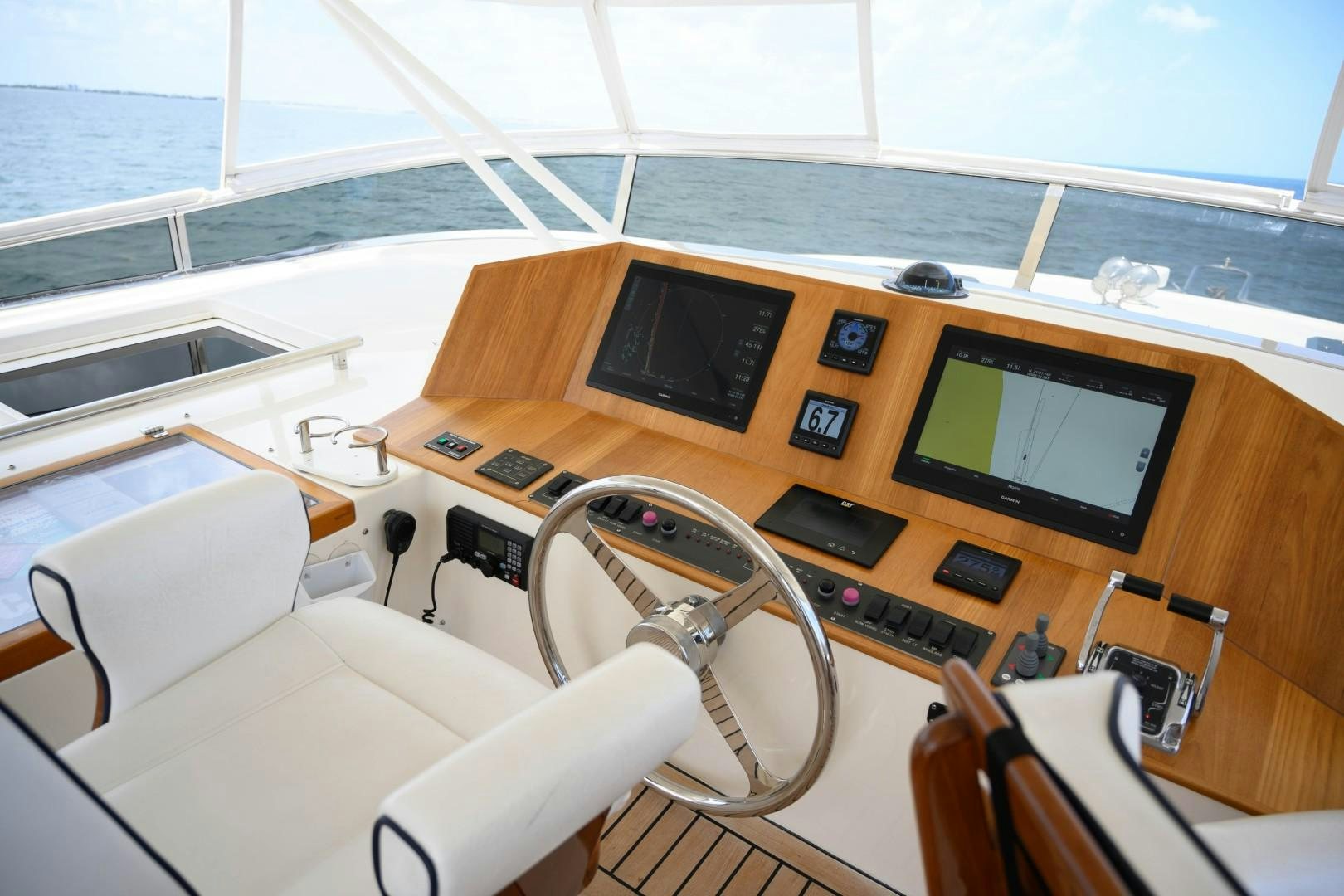 a room with a desk and a computer aboard VK Yacht for Sale