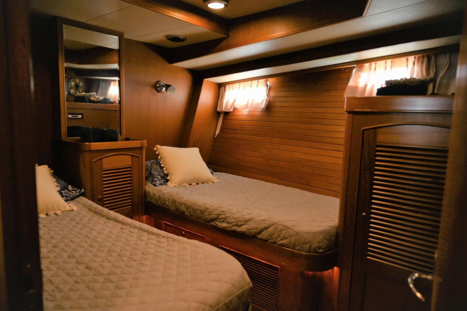 a couple of beds in a room aboard VK Yacht for Sale