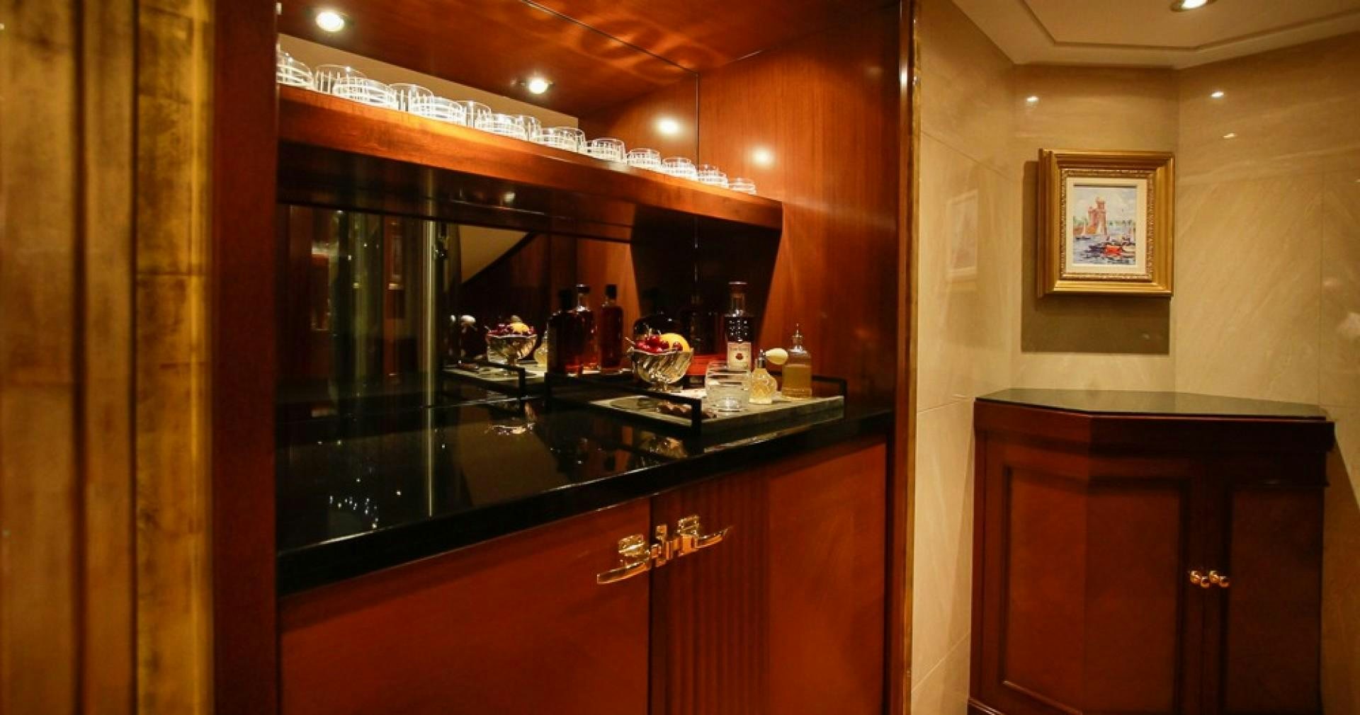 a bar with a counter and a mirror aboard BLUE MOON Yacht for Sale