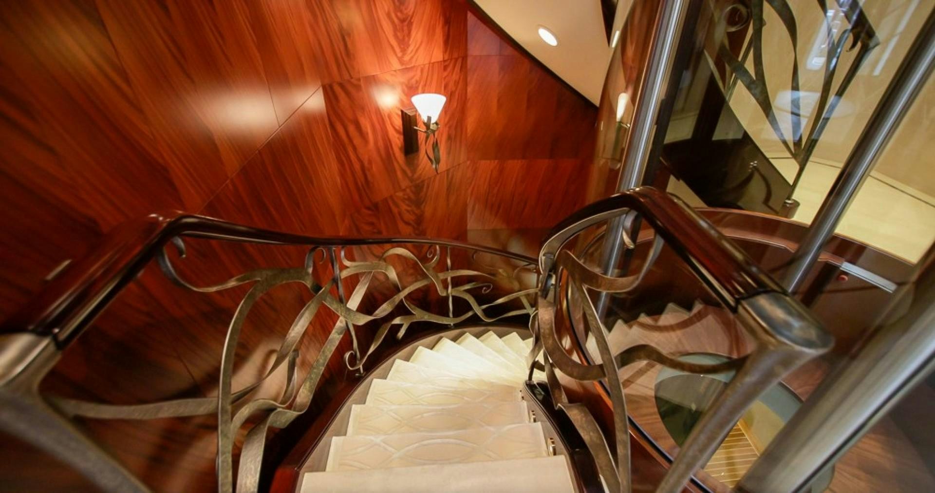 a staircase with a railing aboard BLUE MOON Yacht for Sale