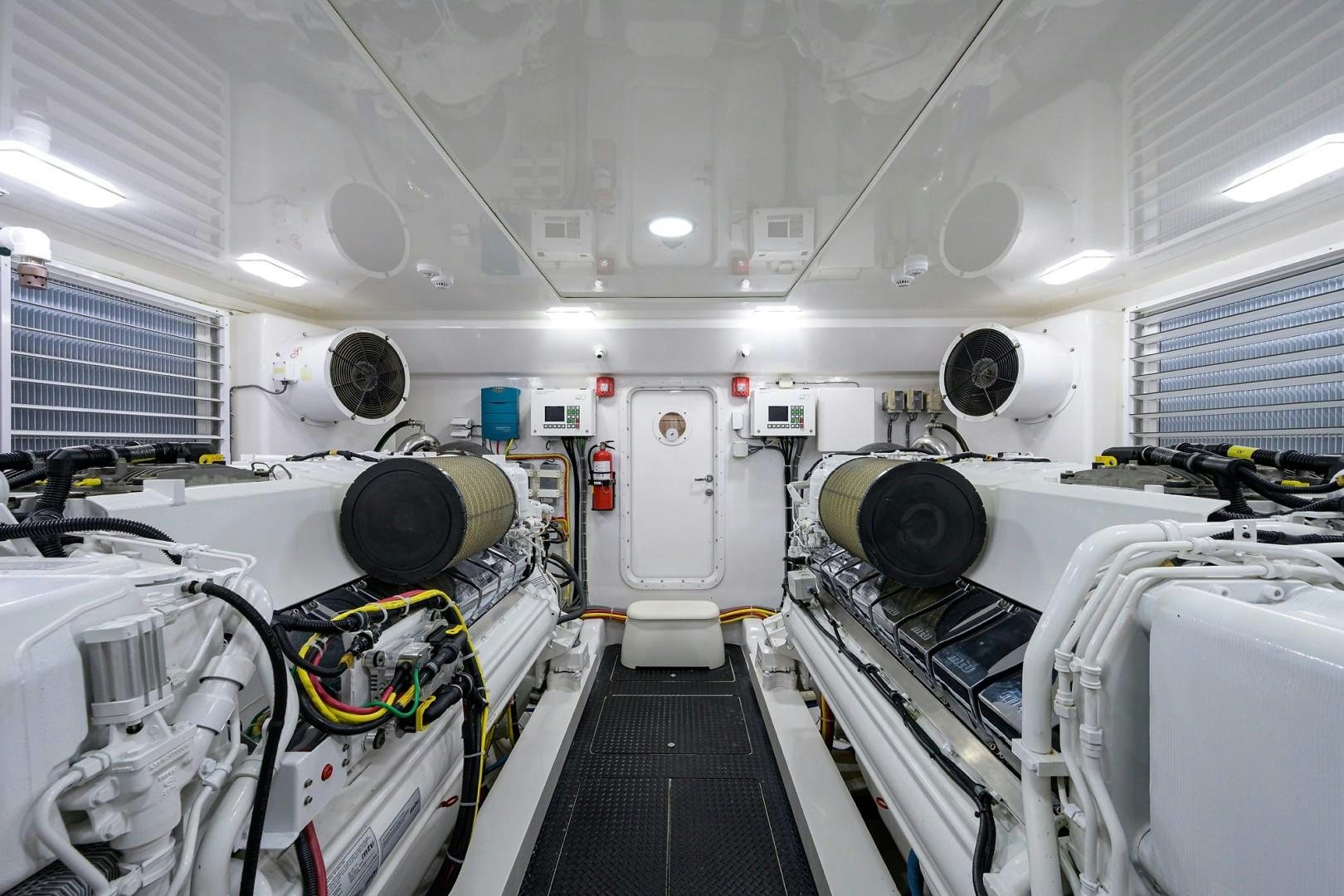 a room with white machines aboard NIKKI BELLA Yacht for Sale