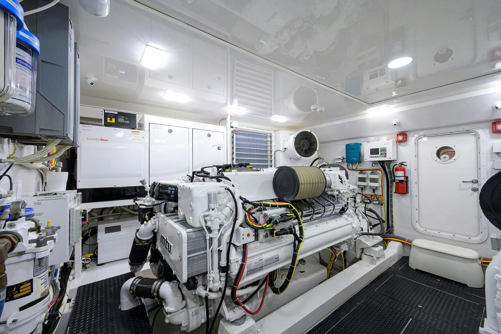 a room with machines and equipment aboard NIKKI BELLA Yacht for Sale