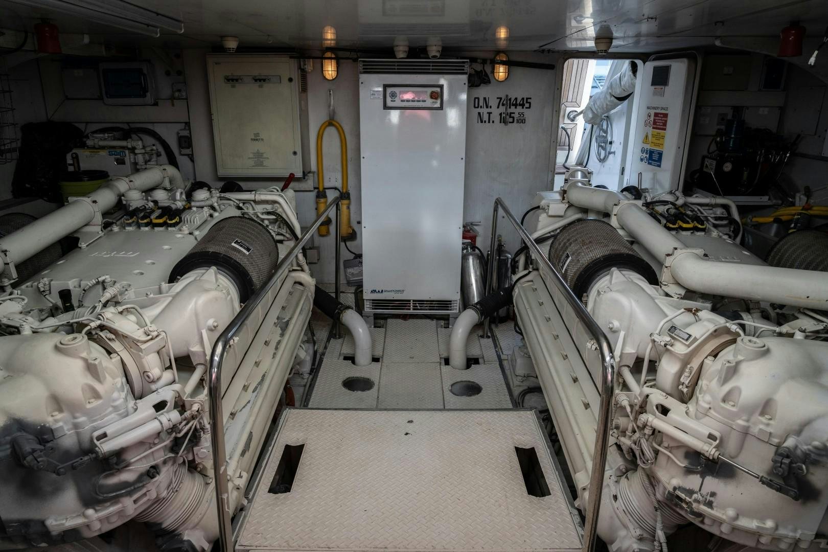 a room with a machine aboard FORTIS II Yacht for Sale