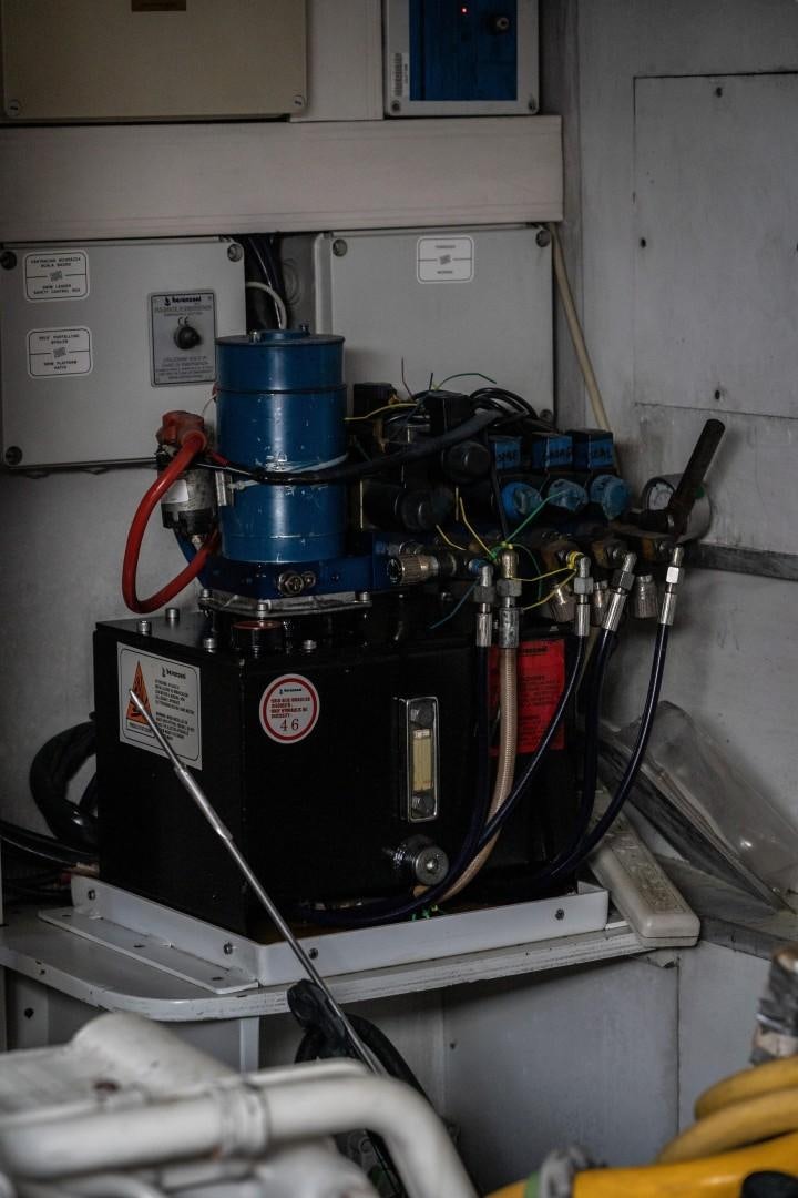 a machine with a blue top aboard FORTIS II Yacht for Sale