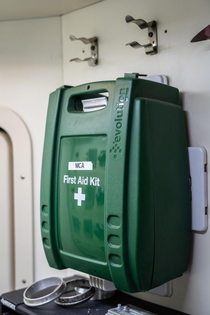 a green rectangular electronic device aboard FORTIS II Yacht for Sale