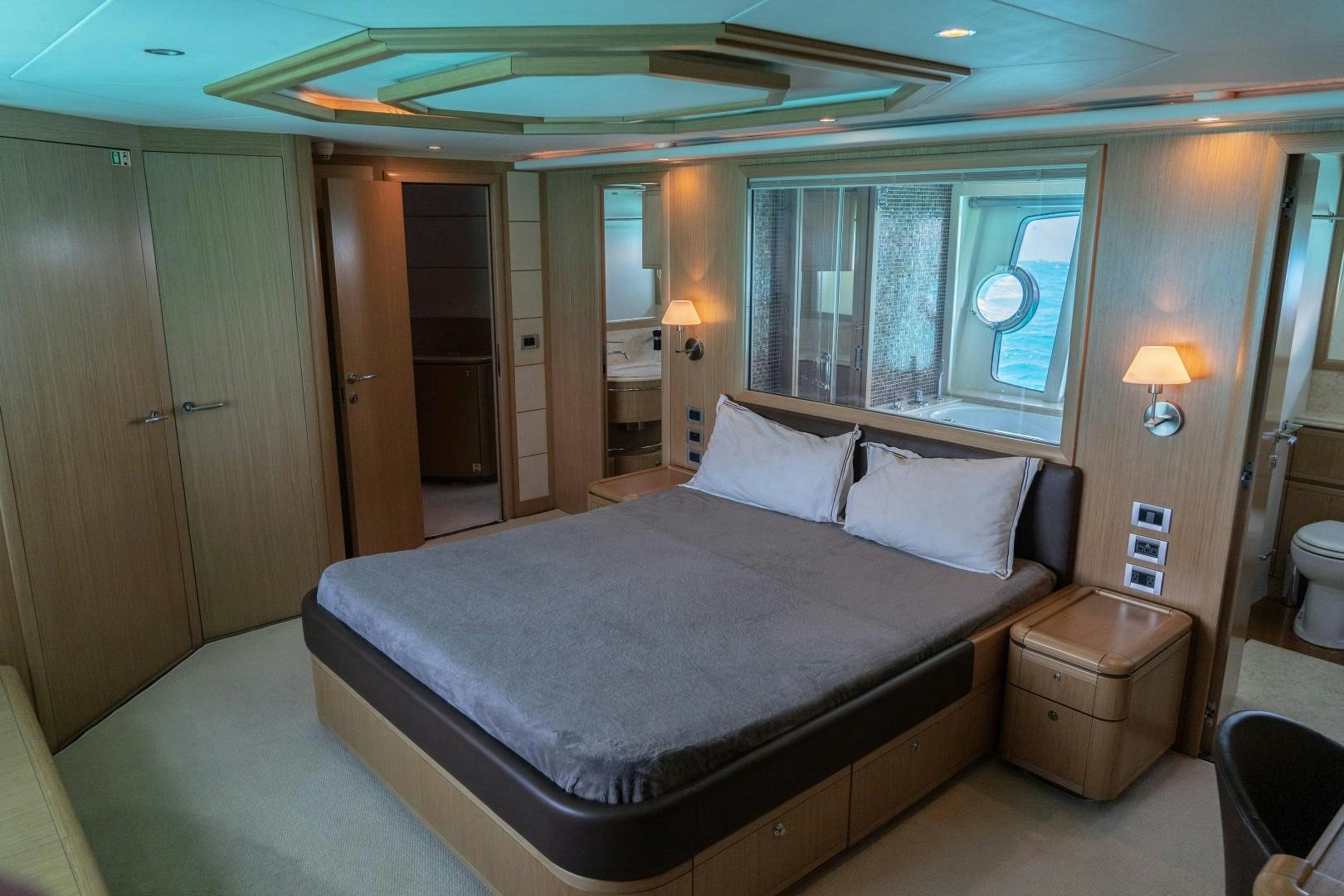 a bed in a hotel room aboard FORTIS II Yacht for Sale