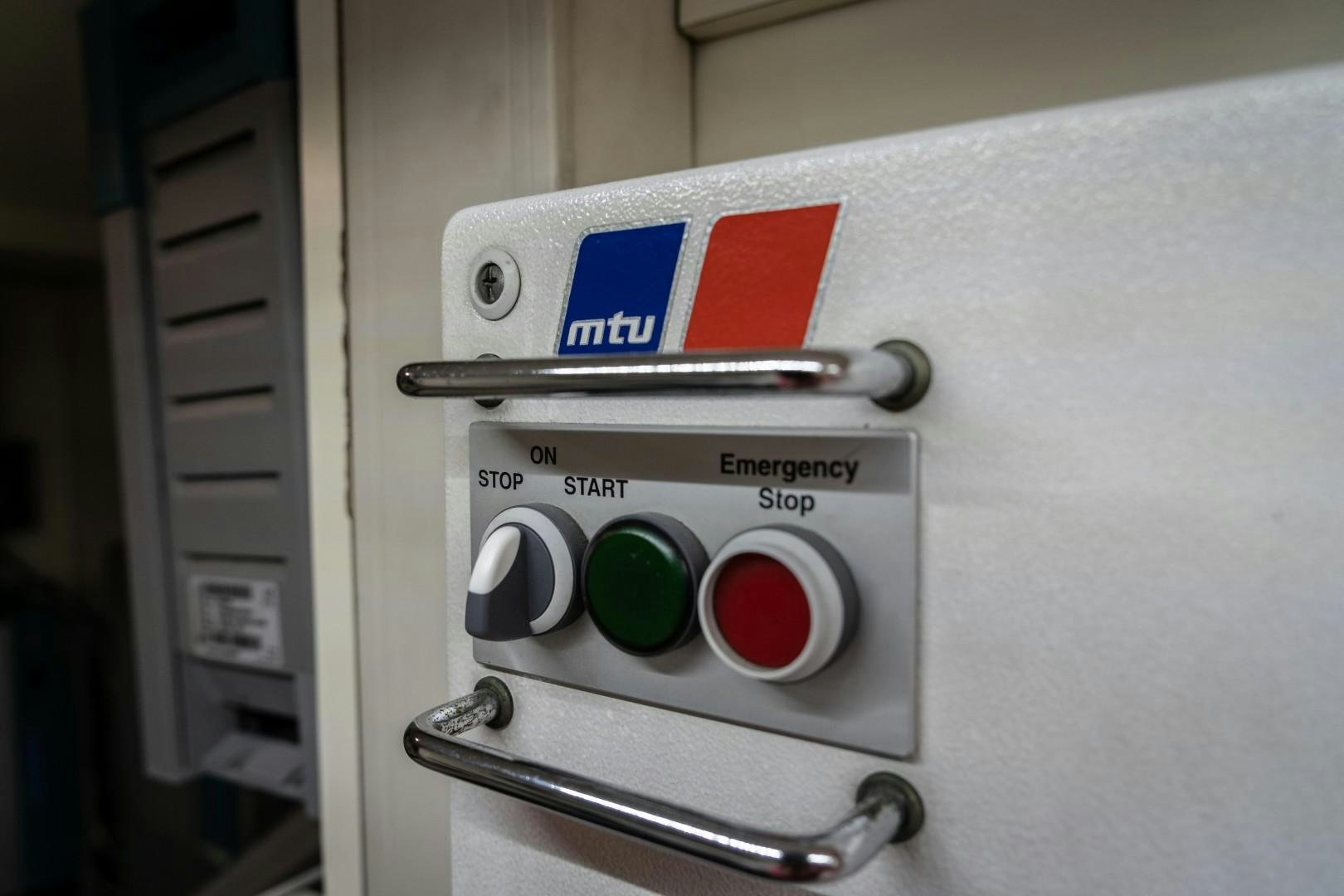 a white machine with a blue tag on it aboard FORTIS II Yacht for Sale