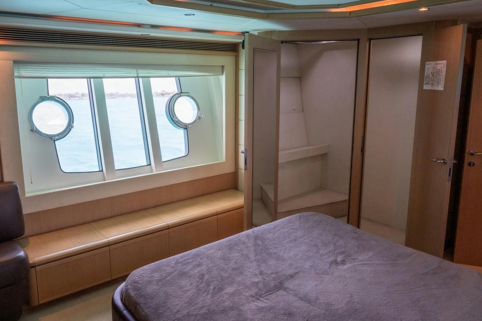 a bed in a room aboard FORTIS II Yacht for Sale