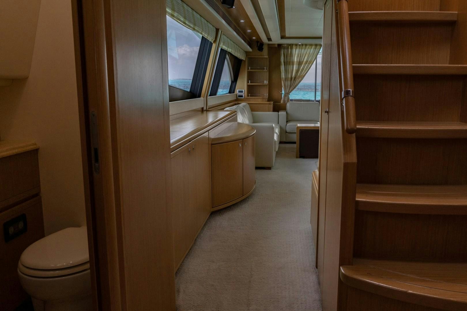 a bathroom with a wood cabinet aboard FORTIS II Yacht for Sale