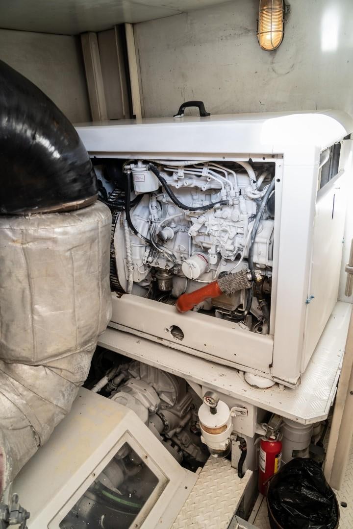 a white machine with a large hole in the side aboard FORTIS II Yacht for Sale