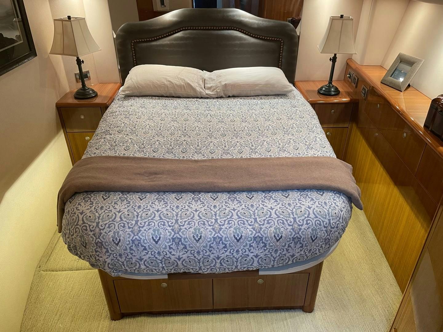 a bed with a pillow aboard BANDIT Yacht for Sale