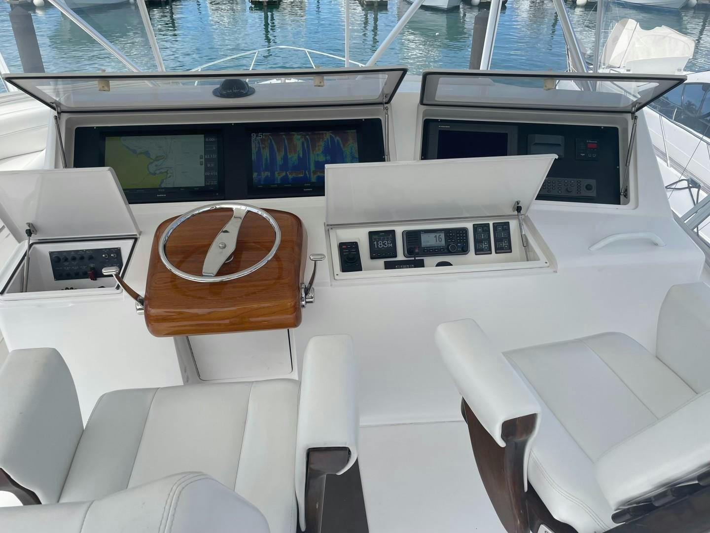 a room with a table and chairs aboard BANDIT Yacht for Sale