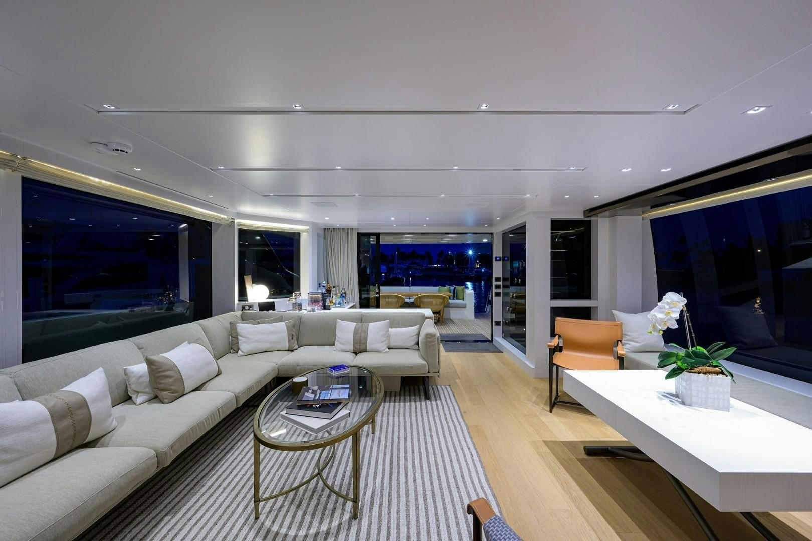 a living room with a large window aboard NINIPOP XL Yacht for Sale
