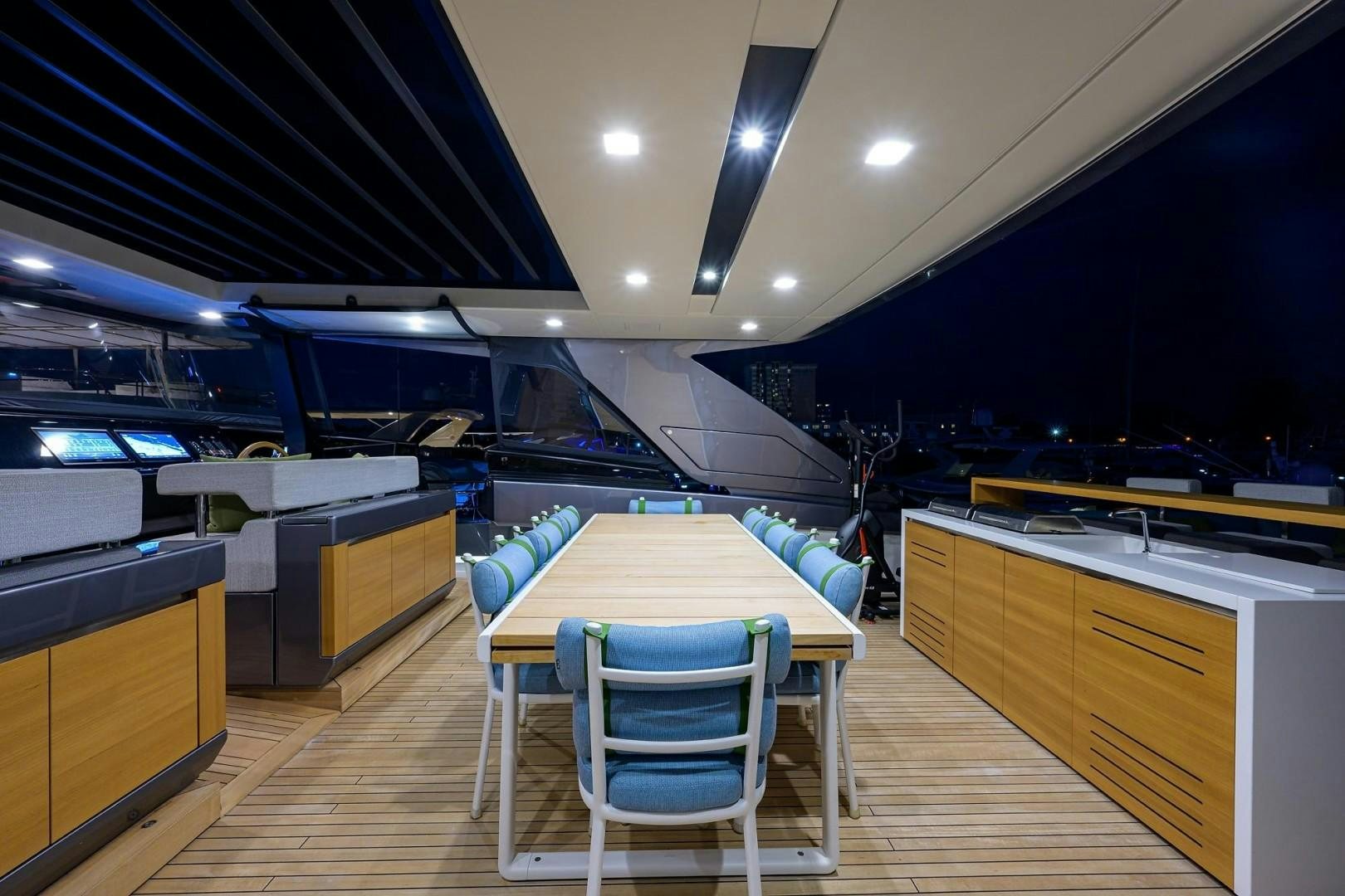 a room with a table and chairs aboard NINIPOP XL Yacht for Sale