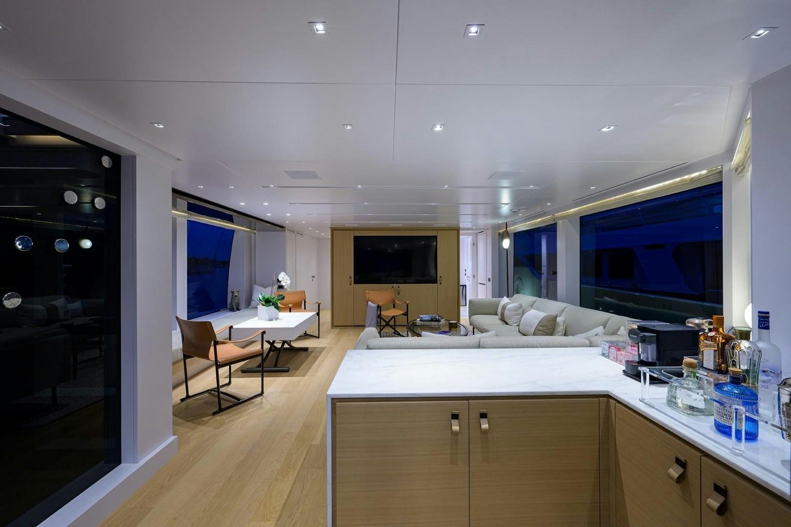 a large kitchen and living room aboard NINIPOP XL Yacht for Sale