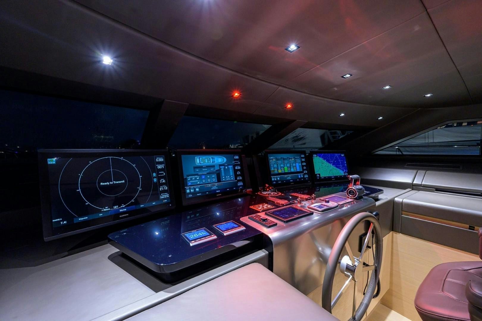 a control room with many monitors aboard NINIPOP XL Yacht for Sale