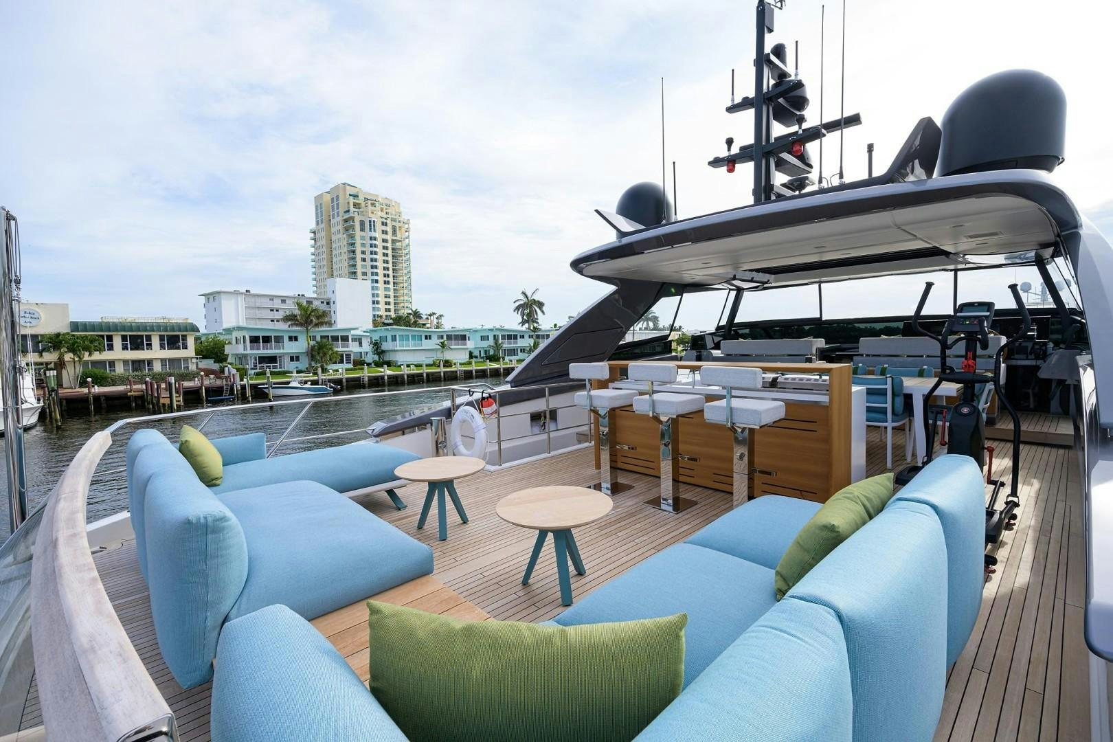 a deck with a pool and a boat on it aboard NINIPOP XL Yacht for Sale