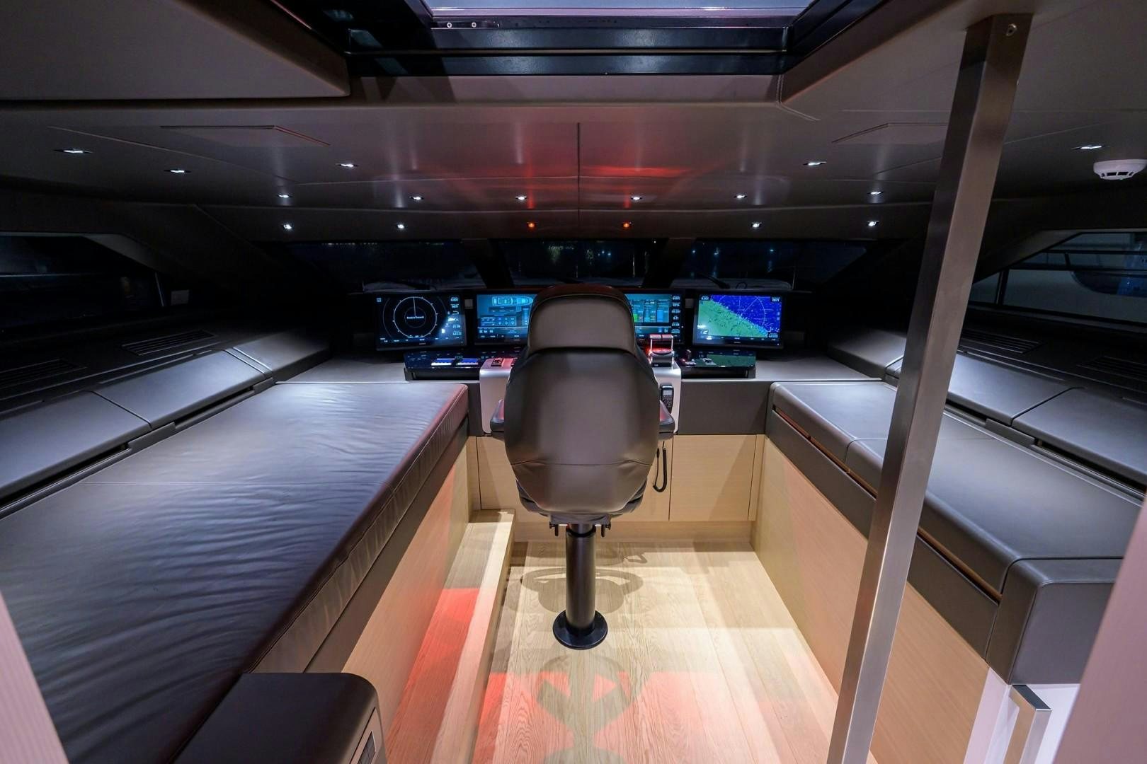 a chair in a room aboard NINIPOP XL Yacht for Sale