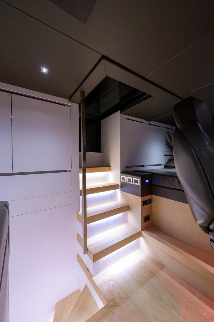 a room with a staircase and a shelf aboard NINIPOP XL Yacht for Sale