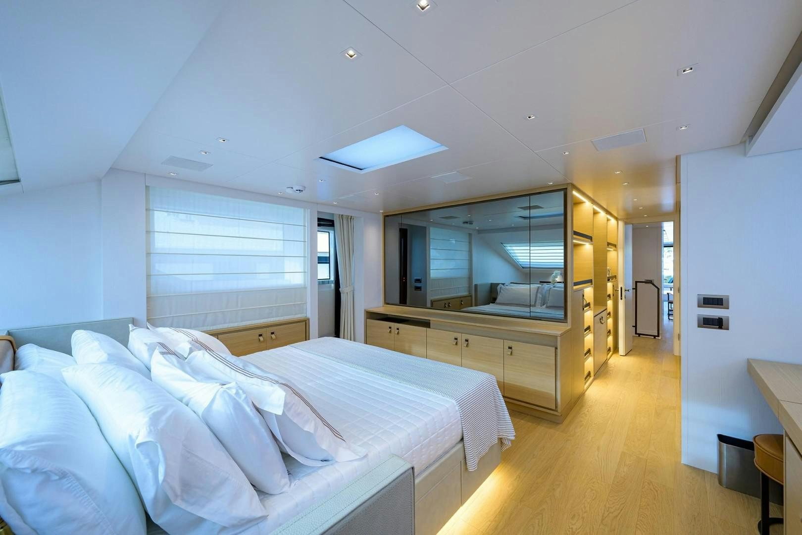 a room with a bed and a tv aboard NINIPOP XL Yacht for Sale